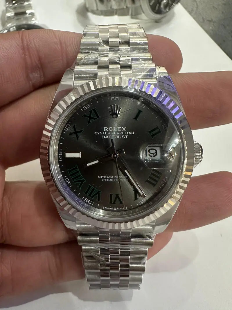 Sell Your Rolex Submariner Omega Seamaster Cartier IWC Patek Nautilus