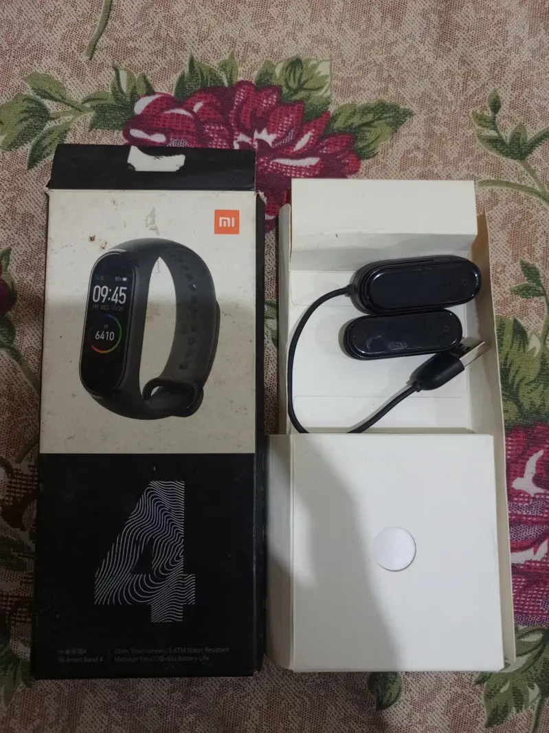 Xiaomi Mi Band 4 (Original) with Box & Charger – Good Condition