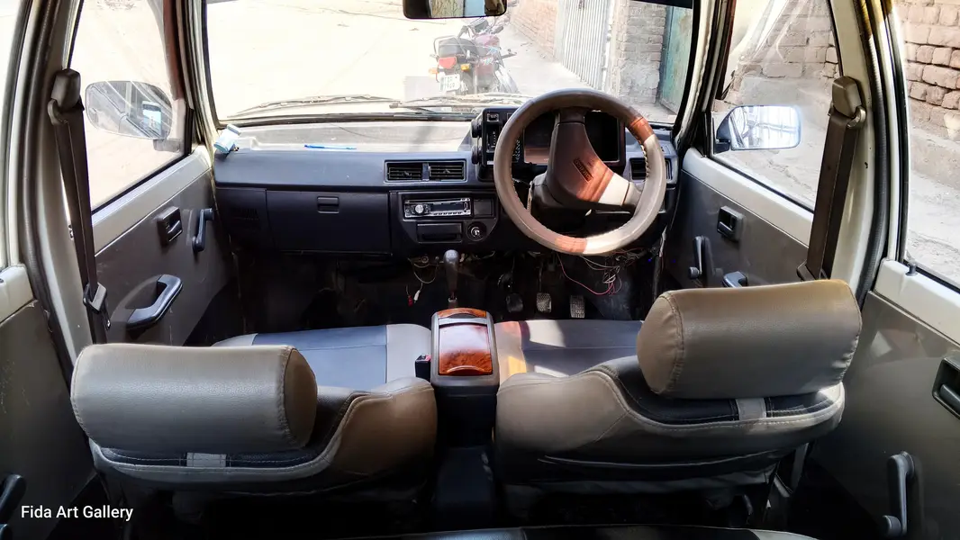 white Suzuki mehran vxr