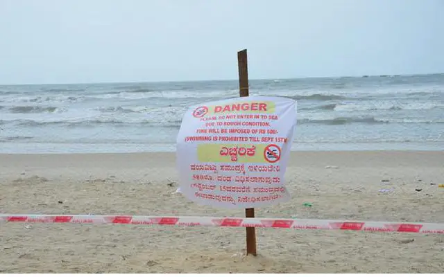 Tourists Ignore Safety Warnings At Malpe Beach Amid Heavy Rainfall