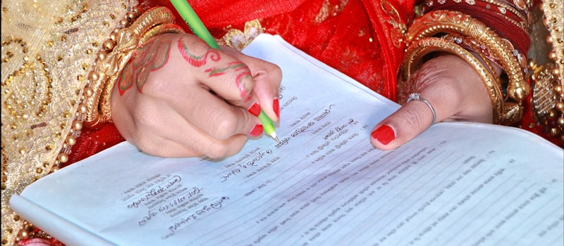 Indian wedding budget planning checklist with calculator and notes for financial readiness