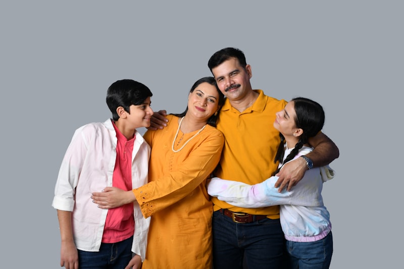 Indian family having a calm conversation in a living room, discussing a rishta decision together