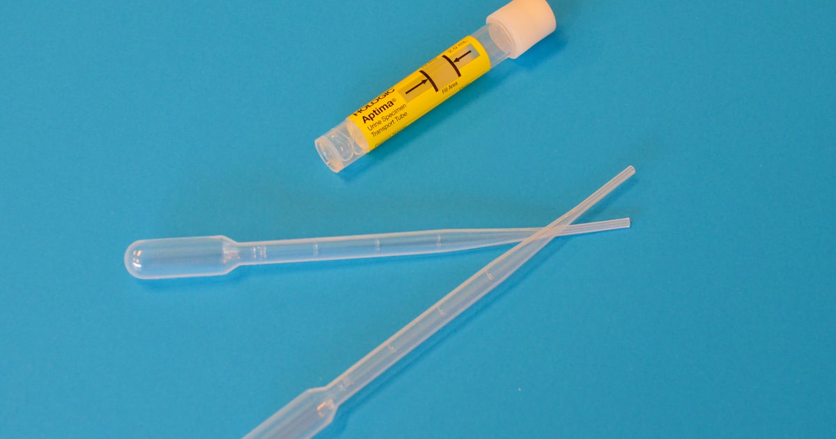 white ballpoint pen beside yellow and white plastic tool